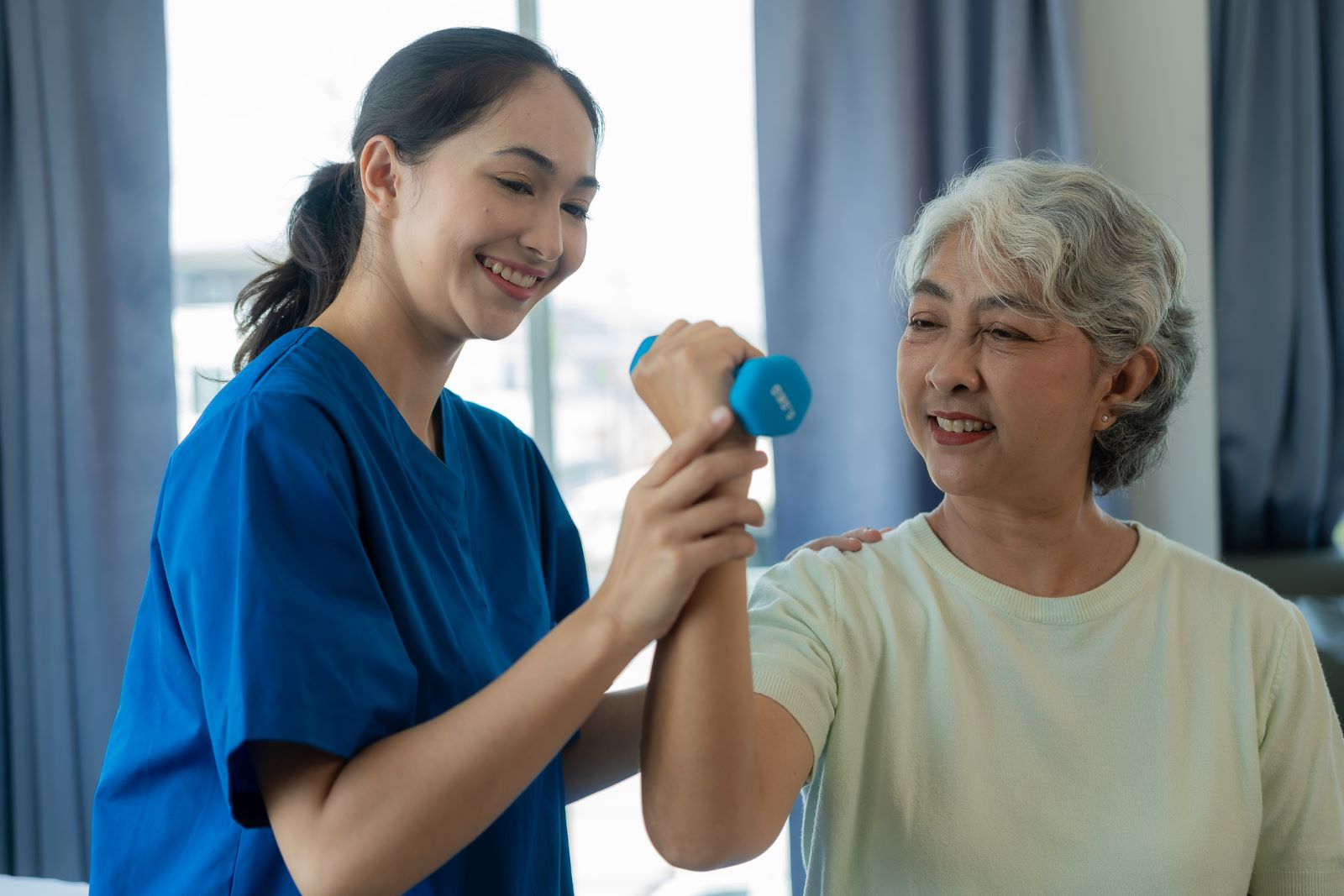 provider patient weight Nurse and patient doing physical therapy in swing bed program